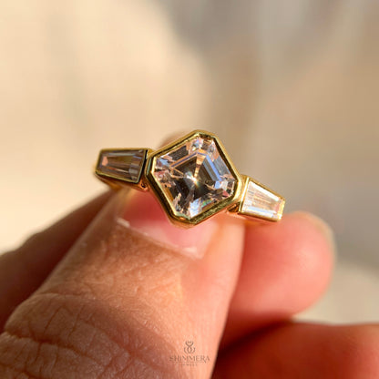 Classic Asscher and baguette three stone ring crafted for engagement proposals