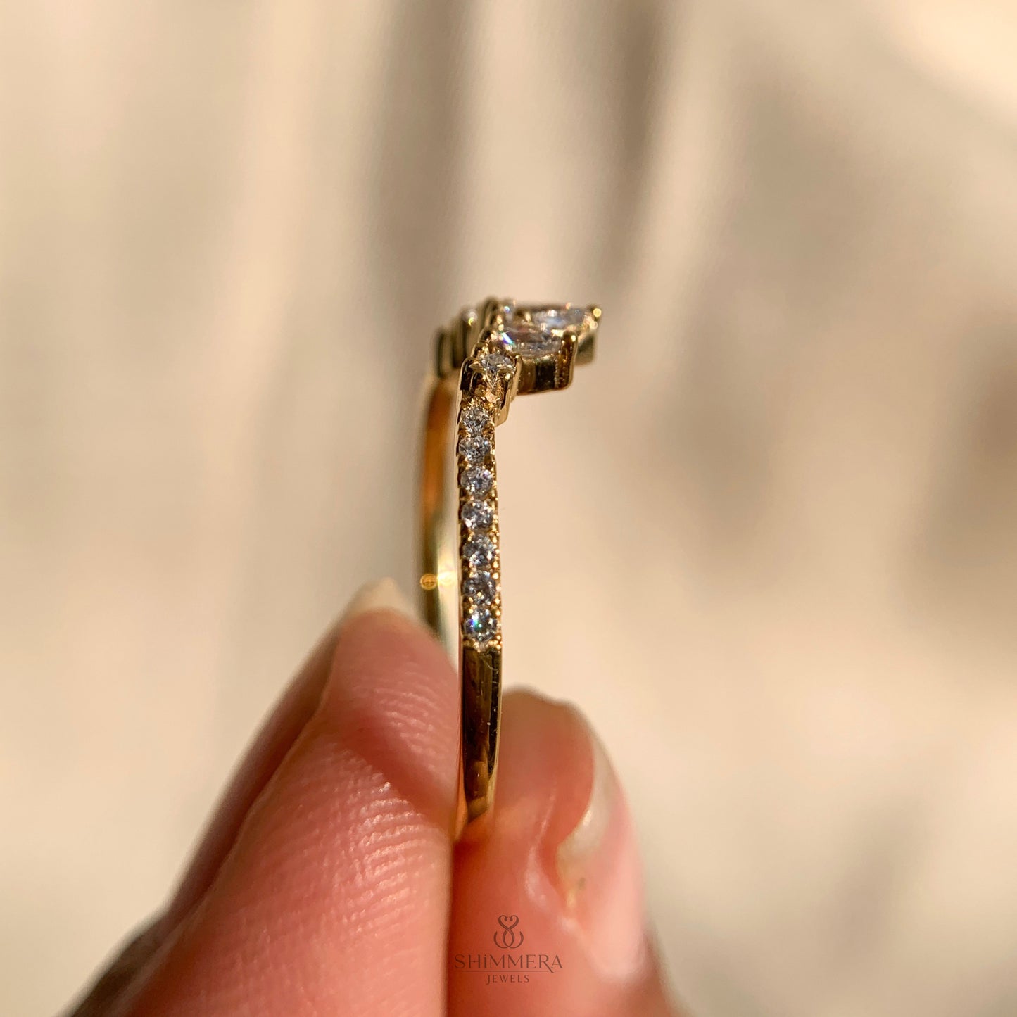 Pear And Round Curved Diamond Wedding Ring