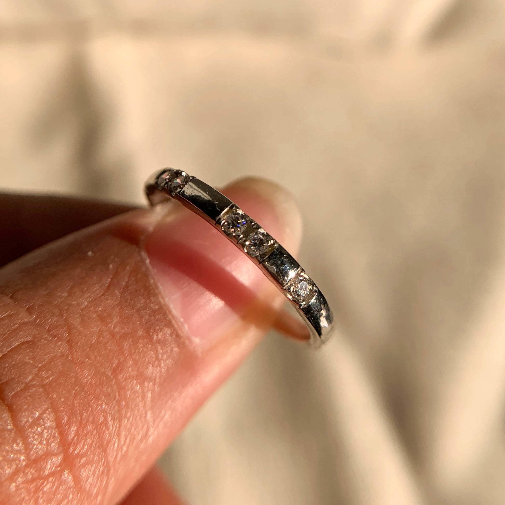 Classic 14k gold wedding band with round brilliant diamonds